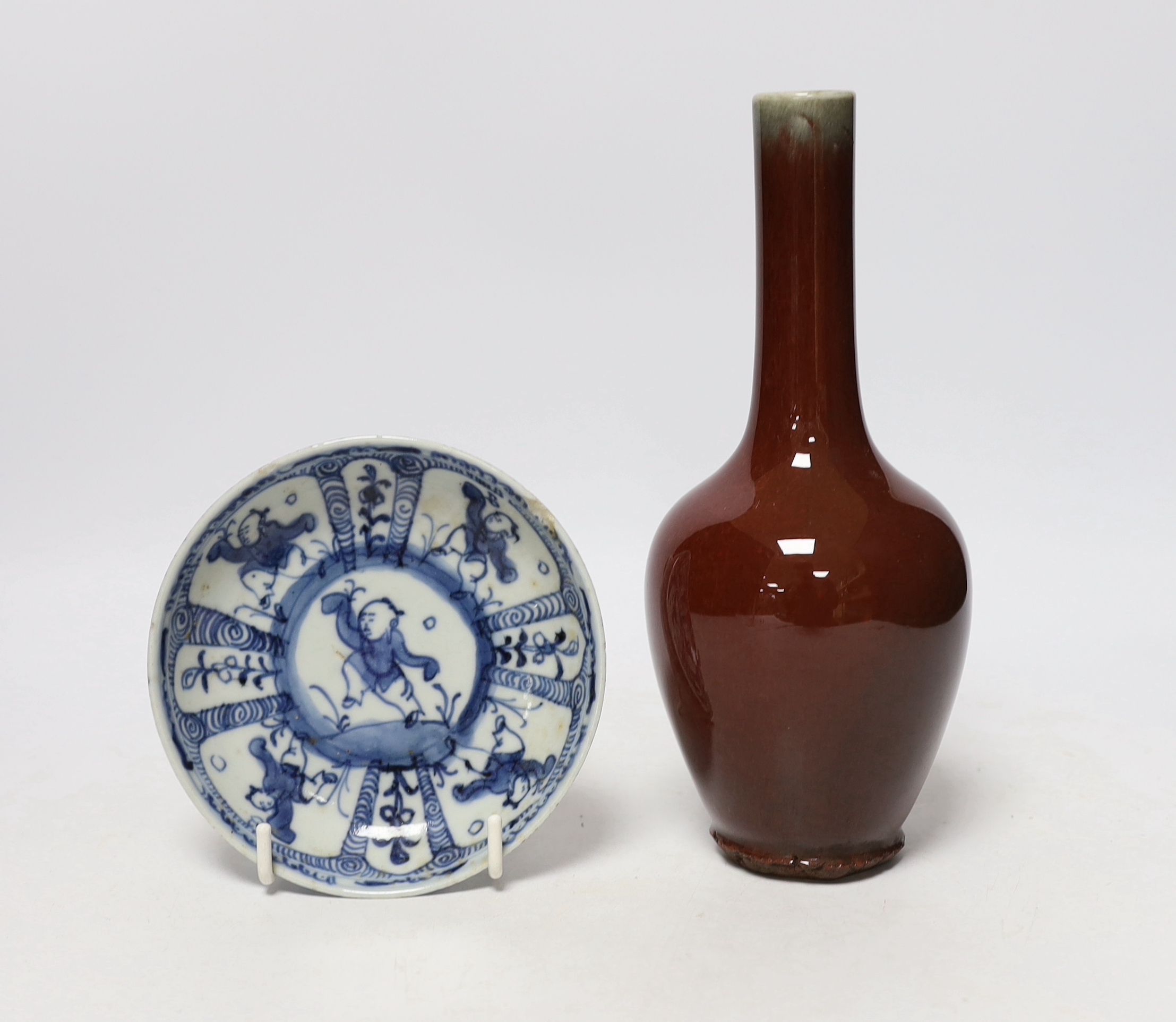 Five Chinese porcelain saucers and dishes and a sang de boeuf glazed vase, vase 21cm high